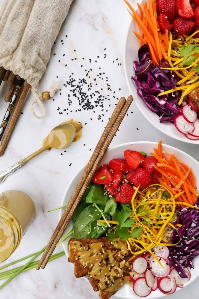 A rainbow coloured bowl of salad.