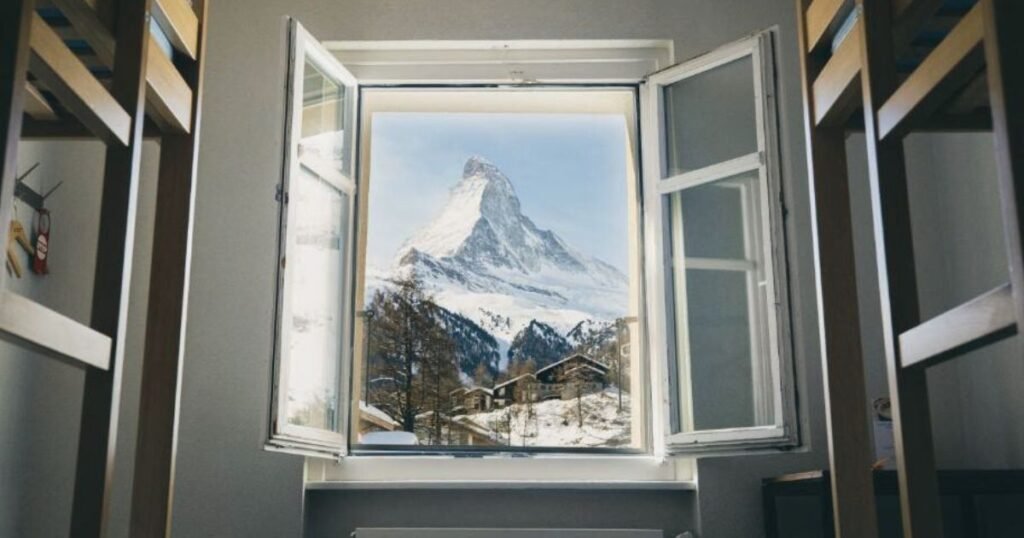 Where to stay in Zermatt on a budget - Zermatt Youth Hostel provides these incredible views of the Matterhorn from its dormitory.