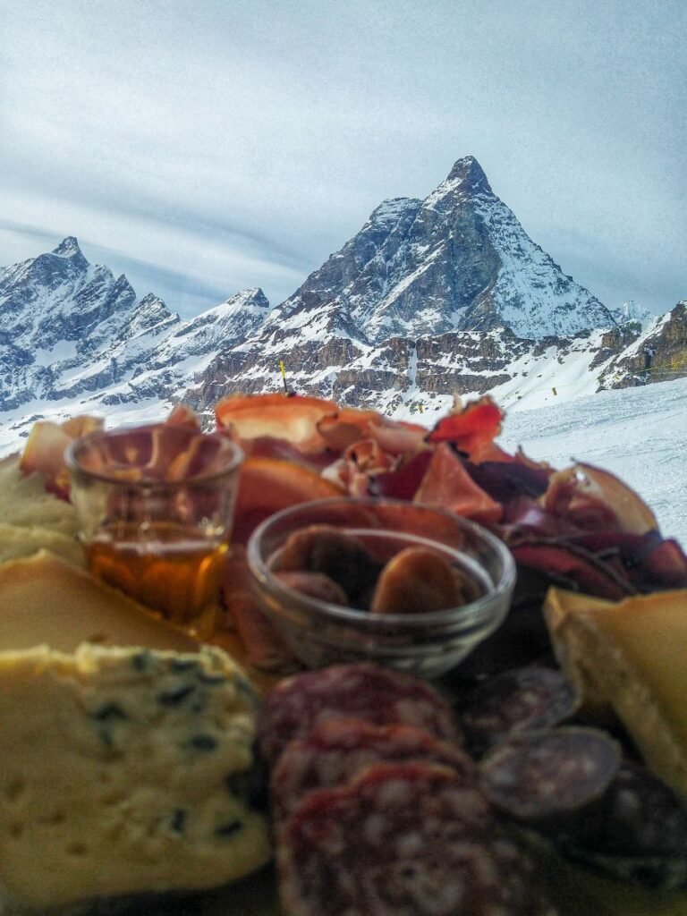 Charcuterie with a view of the Matterhorn from Rifugio Teodulo in Cervinia. 